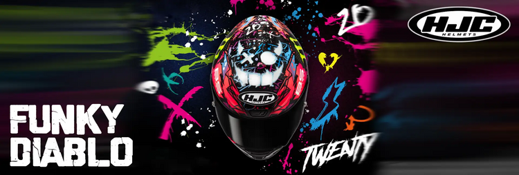 Un casco de motocicleta vibrante y con estilo graffiti, con un diseño de calavera en rojos, negros y detalles neón.